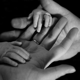 How Can Parents Provide a Safe Climate For Their Children to Speak Openly baby hand mom EMPWR